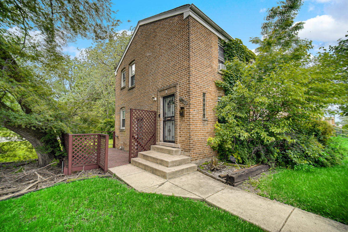 8758 S KIMBARK AVE, CHICAGO, IL 60619, photo 1 of 16
