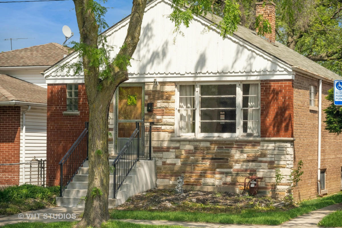 9349 S WOODLAWN AVE, CHICAGO, IL 60619, photo 1 of 10