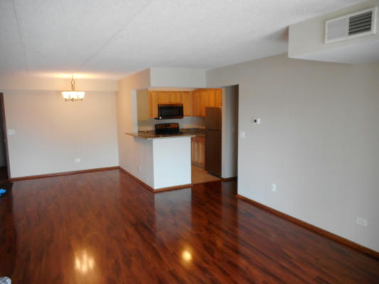 7707 W IRVING PARK RD APT 104, CHICAGO, IL 60634, photo 2 of 19