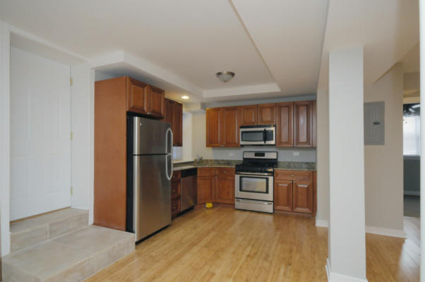 6334 N CLAREMONT AVE, CHICAGO, IL 60659, photo 3 of 7