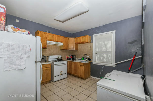 10111 S PERRY AVE, CHICAGO, IL 60628, photo 3 of 13
